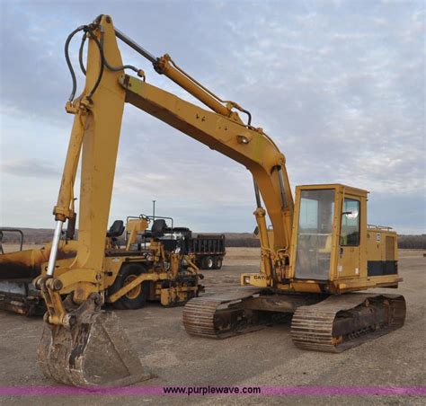 purple mini excavator|225 cat excavator.